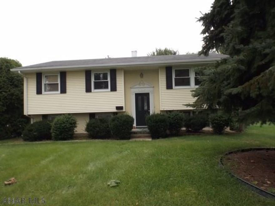 Beautiful suburban setting in a quiet development.  Newer roof, siding and windows.  Submersible pump for well.  Property extends back to second shed.  Interior and windows being professionally cleaned by December 2.