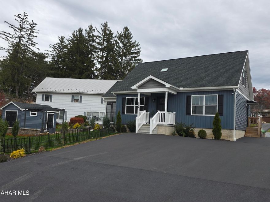 Completed in 2023, this exceptional Hollidaysburg residence combines modern design with comfortable living. Featuring 2 bedrooms, 2 full baths, and a basement plumbed for a future third bath, the thoughtfully crafted open layout is both stylish and functional. The bright kitchen impresses with two-tone cabinetry, gorgeous countertops, farmhouse sink, subway tile backsplash, stainless steel appliances, and a dining area accented by a charming rustic barn door. The inviting living room flows seamlessly for entertaining, while the private primary suite offers a walk-in closet and a spa-inspired bath with soaking tub, tiled shower, and skylights. Outdoor living is equally impressive with a covered porch featuring privacy blinds and a ceiling fan, a paver patio with pergola and gas fire pit,. In addition, beautifully landscaped grounds  create a relaxing, picturesque setting. There is ample parking, as well as electric hookup for RV parking.  The shed with electric adds versatile storage or workspace. This move-in-ready home offers an ideal blend of modern style, comfort, and convenience in a highly desirable Hollidaysburg location. Call today to schedule your showing. Preapproved buyers only. Buyers to confirm taxes, sq footage and lot size.