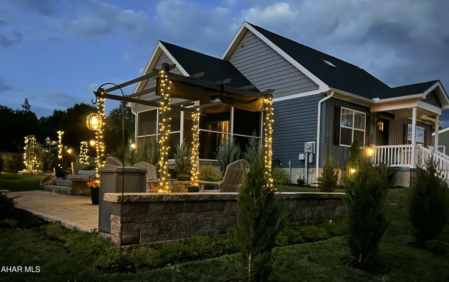 Completed in 2023, this exceptional Hollidaysburg residence combines modern design with comfortable living. Featuring 2 bedrooms, 2 full baths, and a basement plumbed for a future third bath, the thoughtfully crafted open layout is both stylish and functional. The bright kitchen impresses with two-tone cabinetry, gorgeous countertops, farmhouse sink, subway tile backsplash, stainless steel appliances, and a dining area accented by a charming rustic barn door. The inviting living room flows seamlessly for entertaining, while the private primary suite offers a walk-in closet and a spa-inspired bath with soaking tub, tiled shower, and skylights. Outdoor living is equally impressive with a covered porch featuring privacy blinds and a ceiling fan, a paver patio with pergola and gas fire pit,. In addition, beautifully landscaped grounds  create a relaxing, picturesque setting. There is ample parking, as well as electric hookup for RV parking.  The shed with electric adds versatile storage or workspace. This move-in-ready home offers an ideal blend of modern style, comfort, and convenience in a highly desirable Hollidaysburg location. Call today to schedule your showing. Preapproved buyers only. Buyers to confirm taxes, sq footage and lot size.