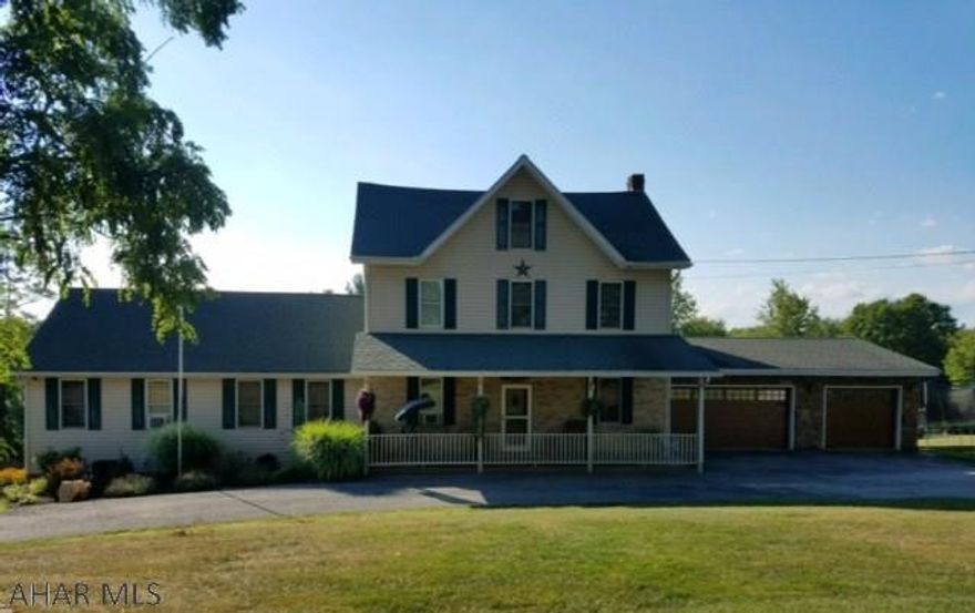 If you are looking for a large home in a beautiful country setting this is the one. This 7 bedroom 2 bath home on 1.57 pristine acres in Loretto is beautifully updated. The spacious kitchen has plenty of cabinets and large granite counter-tops to spread out on.  Both kitchen and dining room have new flooring and they feature stamped tin ceilings. Main floor also has den/office, LR, FR and master bedroom suite.  Entertain family outside on the large deck. There are sliding doors from both dining and master bedroom. Enjoy the well landscaped yard with fruit trees and grape arbor or fish from your own pond. New stamped cement, and garage doors. A 21 Run boarding kennel or turn it into another garage. Sellers are offering a home warranty and also $8,000 carpet allowance.