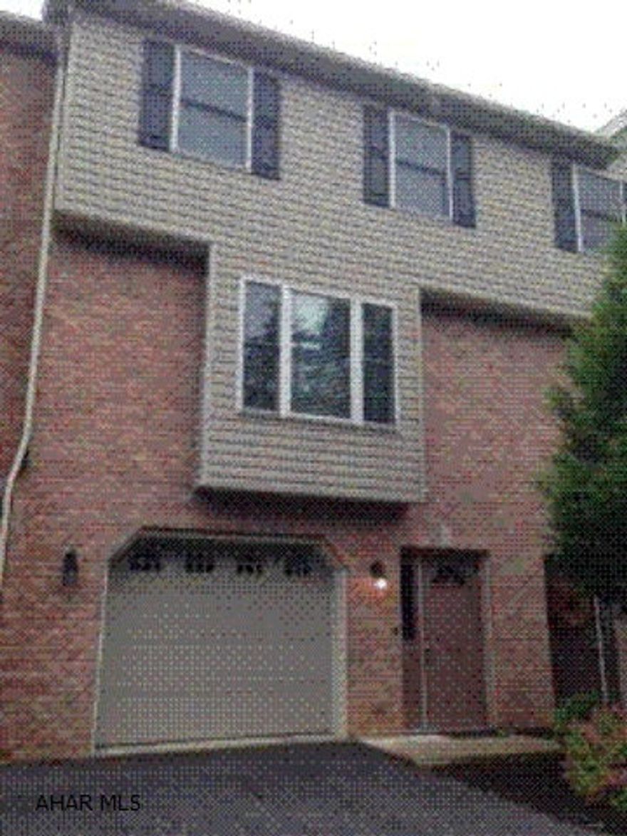 Well appointed townhouse in private secluded location. Ceramic tile and hardwoods, eat in kitchen, nicely maintained. $50 maintenance fee for lawn care and snow removal.