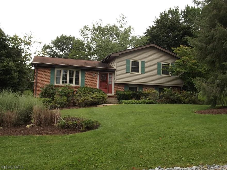 Most rooms freshly painted - double french doors from master bedroom to a deck.  2 family rooms, 1 with a fireplace, brick patio from lower level.  Deck off the dining room.  Private landscaped back yard .  Shed, 2 car garage, new windows, cement driveway.  Electric & Electric heat pump. Hard wood floors have been redone. Ceramic floors recently professionally cleaned.  Foot of Tenn Elementary school