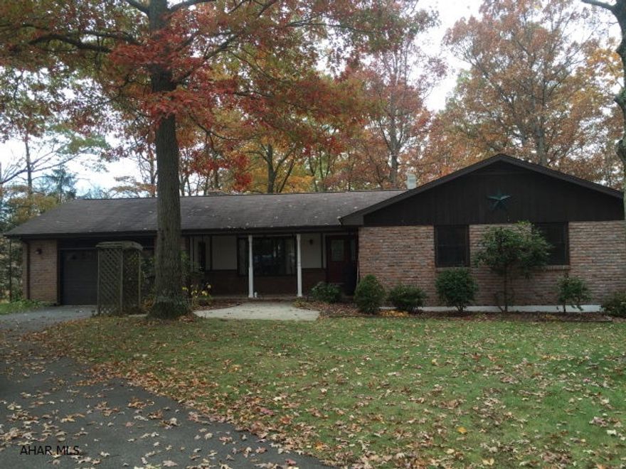 Beautiful brick ranch sitting on 2.27 acres. Wooded setting. Three bedrooms, 2 full bath with 1st floor laundry. Wood burning fireplace in living room and a wood burning stove in finished basement. Nice back deck. All around nice home.