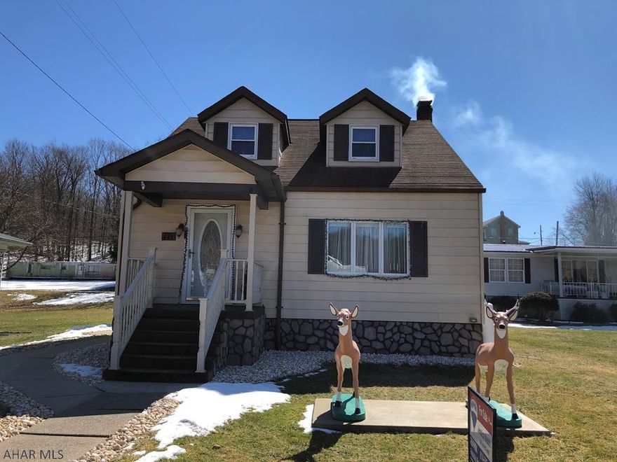 Extremely well maintained home in Penn Cambria.  3 large bedrooms, large living room with wood floors.  Kitchen is open to dining area.  Very spacious.  1st floor bedroom has large bonus space - could use as an office.  Very large bath on 1st floor with separate shower and bathtub.  Enclosed porch.  Covered deck.  Covered porch.  3 garage spaces.  Newer furnace and air conditioning.  Room sizes are approx.  Taxes to be verified.