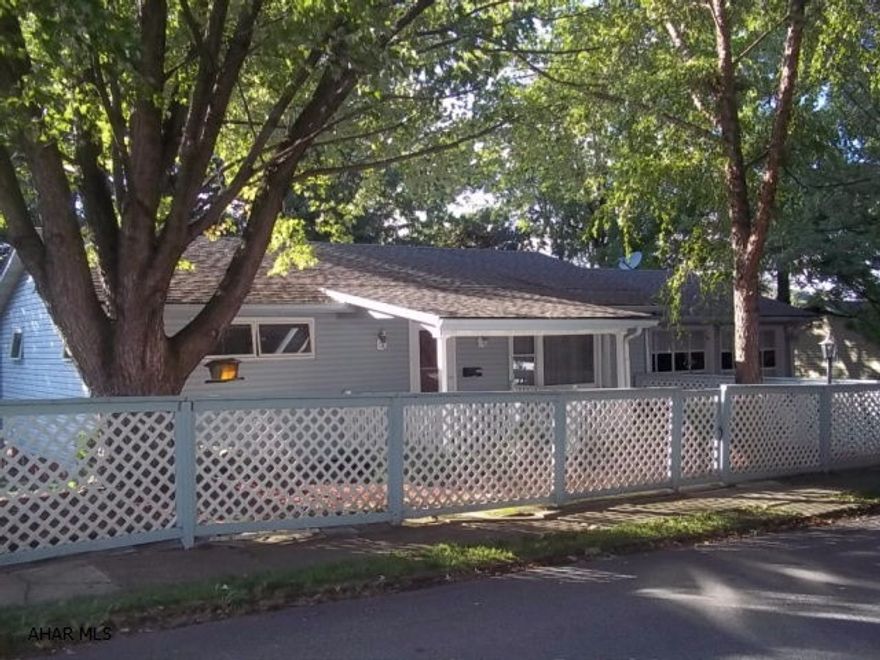 Reduced. Well maintained 3 to 4 bedroom ranch home on a large nicely landscaped city lot great for entertaining. Eat in kitchen. Hardwood floors under carpet. Deck with attached gazebo. Plenty of parking with 2 car attached garage, 1 car detached garage, off street parking, large shed, fire pit, raised vegetable gardens, pond, finished basement, includes family room and the 3rd and possible 4th bedroom, and half bath. fenced in front yard, newer windows. Home warranty included.