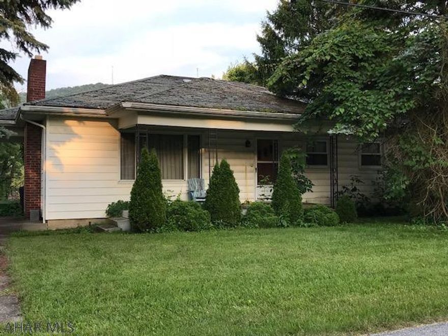 HANDYMAN OR CONTRACTOR SPECIAL OPPORTUNITY! VERY SWEET 1960 2 bed ranch on 1/2 acre lot in nice and convenient area on private dead end street.  Newer thermopane windows and vinyl siding, soffit and fascia.  Hard wood floors in bedrooms and under living room carpet.  Heat was on all winter so no freeze damage.  2 fireplaces and a semi finished basement.  On car integral garage in back as well as entry to old beauty shop.  There is a lot of TLC needed including electric box update, a new roof, chimney repair, one ceiling replaced and water infiltration in the basement but values in this neighborhood high.  Original 1960 kitchen and bath still functional and in good condition if you are going for retro look! Good bones...plaster walls, hw floors! CASH Sale and AS IS. Make an offer.