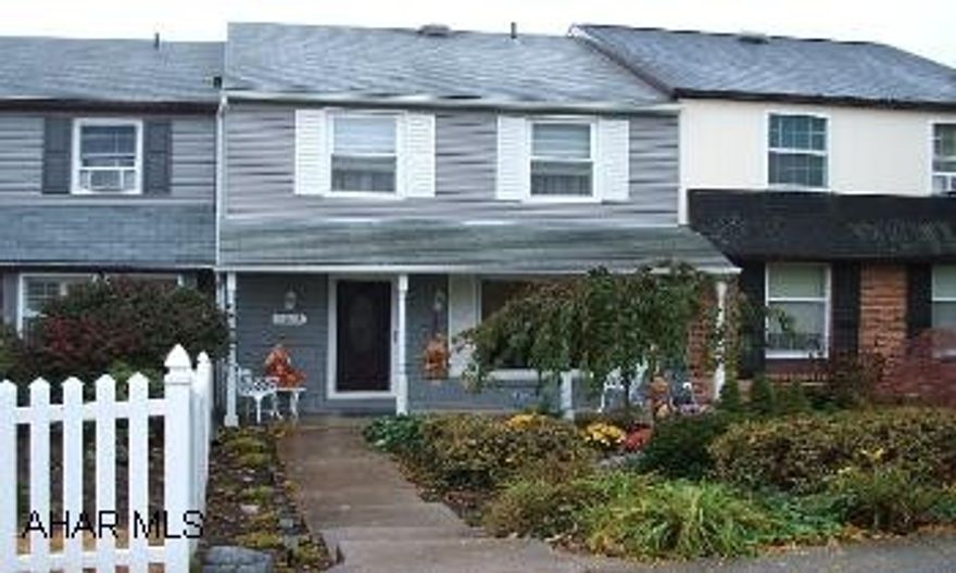 Brand new kitchen in 2005.  New 1/2 bath. Windows in 2004.  New Pergo floor.  New ceramic floors.  New French doors from LR to screened in sun porch with a gorgeous view of the mountains.  New landscaping.  Plus many more amenities.  Absolutely immaculate townhome.  Must see to believe.  Tons of closet space.  Full finished basement with FR and Wet bar.  Wet bar has Jenn Aire grill and refrigerator.  Perfect for entertaining - Also door out to a private deck with gorgeous view.