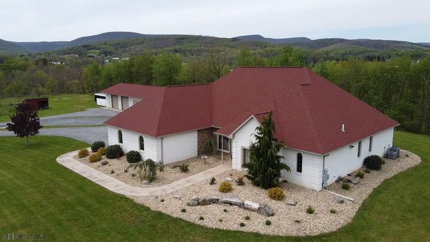 3D virtual walk through tour - check out the links! This exquisite property provides the kind of Central PA atmosphere that you want. 5.77 acres The home boasts five bedrooms all on one floor living with an attached two car garage and a detached 3 car garage. The Fireplaces and Hardwood floors make the house feel very inviting and cozy. The kitchens beautiful maple cabinets compliment the granite countertops and the 10ft. ceiling heights makes each room feel like a grand entrance. The outside is filled with beautiful landscaping, and hardscaping. Radiant heat in the floors, to keep you warm in the winter and central air for your too warm summers. This home is complete with everything you could want. Fantastic views, close to everything with executive privacy.