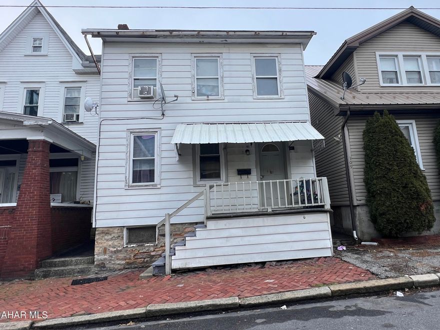 Two bedroom home in Altoona with 20x20 detached garage. Property is currently used as a rental.