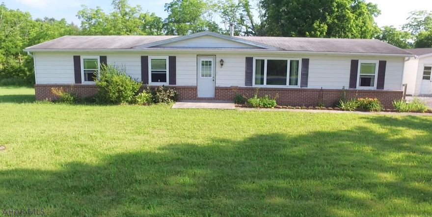 See Drone Video attached to see this house up close.  Exceptional value with so much potential.  City water, city sewer and central air.  Lovely location on quiet street.  Fabulous upgraded kitchen with walk out to private deck.  Recently professional treated for mold.  All documents included.