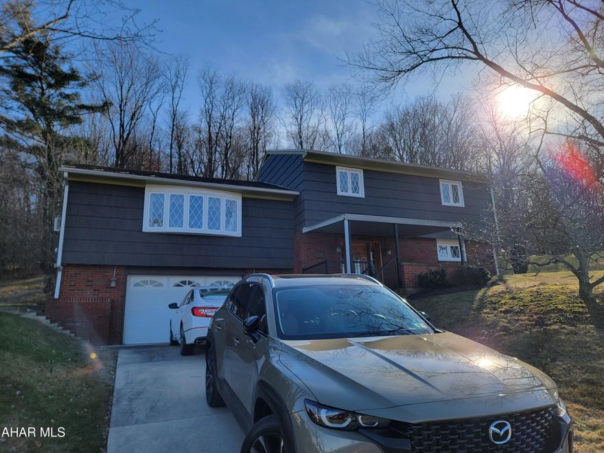 Nice 3 bedroom, 1 1/2 bath split-level home on .58 acres across from Tyrone Area High School and Middle School. Finished lower level includes rec room, full bath and laundry. Oversized 1 car built-in garage.