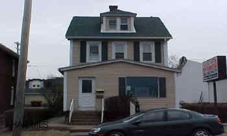 1st Floor Professional Office - 2nd floor apartment occupied.  2nd Floor rents $475 - includes everything.  New roof, New hot water tank. 1st Floor Professional Office - 2nd floor apartment occupied.  2nd Floor rents $475 - includes everything.  New roof, New hot water tank.