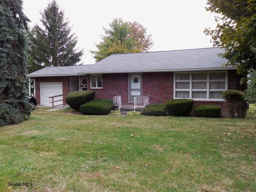 All brick rancher on lovely  corner lot in Pleasant Valley. Living rm with fireplace, eat-in kitchen.Hardwood floors.  Breezeway between house and garage.