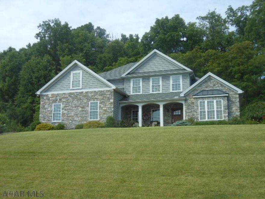 Stunning two story home located in Pleasant View Estates. It features four bedrooms, two and half baths all on a one acre lot with majestic views of the valley. Ash hardwood floors, granite counter tops, maple cabinetry, solid six panel doors throughout, zoned heat and A/C by floor. Cathedral ceiling in living area, private back yard professionally landscaped. Too many upgrades to mention. Motivated Sellers, looking for offers. Call for details and your appointment.