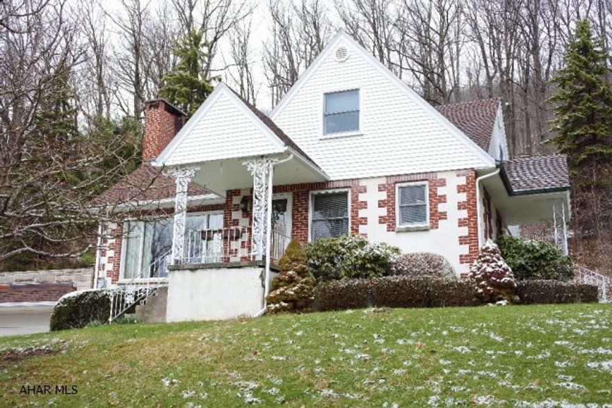 This is it if you want privacy and a country setting!  4 Bedrooms, 2 Baths, Hardwood floors, FP, Wooded views, private lane. Patio looks out over the wooded lot...plus there is an outdoor fireplace...perfect for Summer evenings.  Watch the deer from the living room's huge picture window.