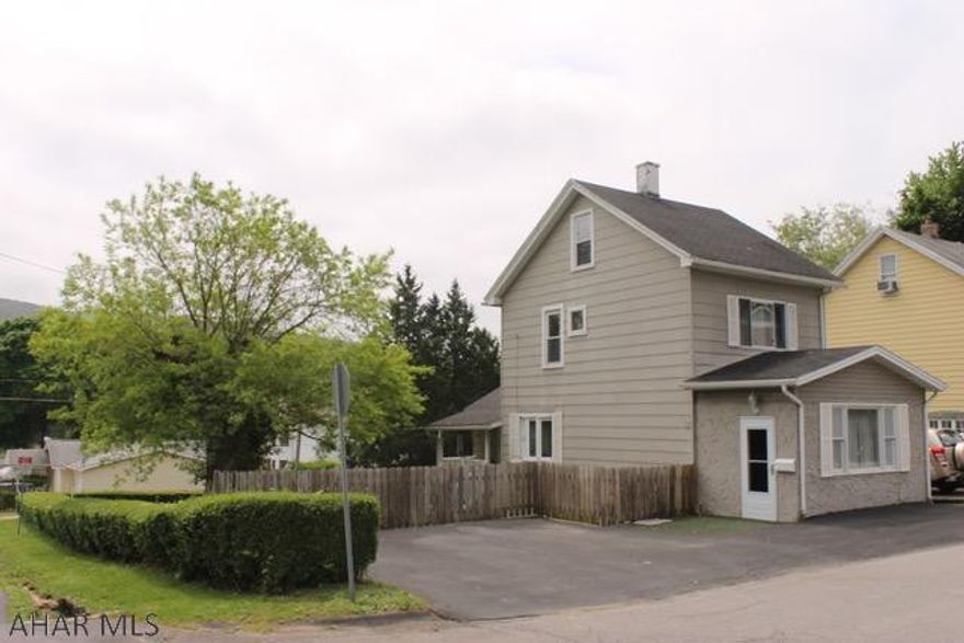 Cozy 2-3 bedroom situated on a double corner lot in the desirable Pleasant Valley area.  Large, flat, fenced yard with plenty of off street parking!  First floor offers an oversized living room with a gas fireplace, dining room and kitchen with stainless steel appliances.  Second floor, you will find two bedrooms and full bath, and the third floor can be a third bedroom or bonus room complete with closet, heat, carpet and storage.  Don't wait - this will go fast!  Seller is a licensed PA real estate agent.