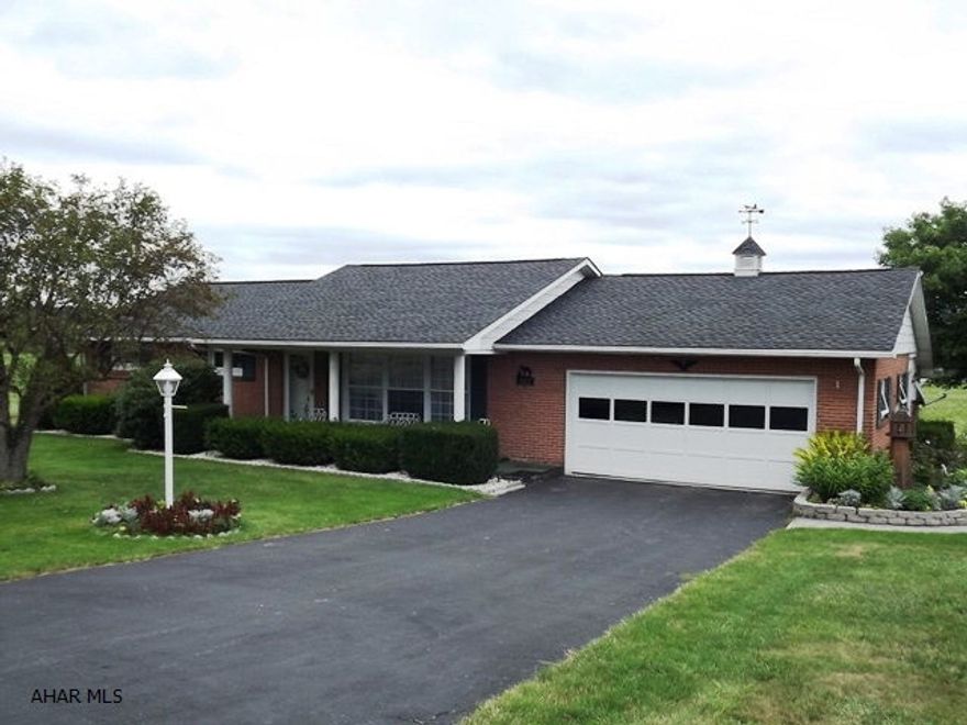 Impeccably maintained 1969 brick ranch on 1.4 acres. Family room addition with wood/coal stove. 34'x 28' barn with electric, shed, gazebo, perennial gardens. Central air and mountain views! Minutes to Shawnee State Park. Hard to find a house in this condition.