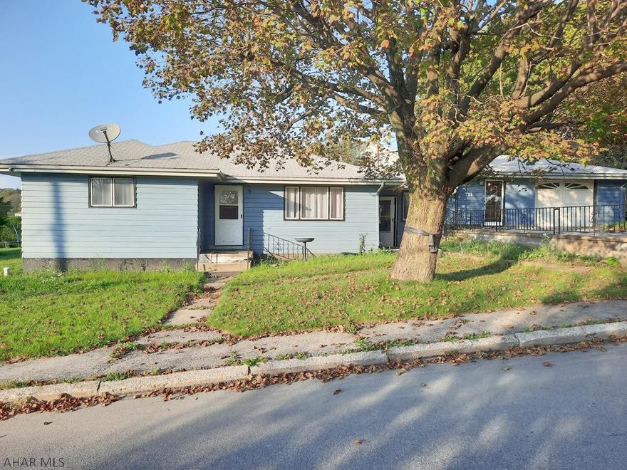 Price Reduced!  Great single story home on a corner lot in Gallitzin!  This home has been renovated and is move-in ready.  New countertop, backsplash, and LVP flooring in the eat-in kitchen.  Hardwood floors refinished throughout.   Cozy living room area with a large coat closet leads to 3 bedrooms and a full bath.  The bath has new vanity and flooring.  Freshly painted inside and out.  Large clean and painted basement with a ton of storage and enough space to be finished.  Basement and kitchen access to a breezeway.  Detached garage with a new entrance door.  Seller is motivated.