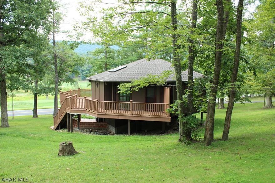 Some folks call them Topsiders, this one is called "The Villa". One of the few with extra ground to add on extra living space, build a garage etc. The view out every new window and door is amazing! See the complete list of updates made attached to the sellers disclosure. Roof, Deck, Patio, Light fixtures, Heat Pump, Custom Blinds, Appliances, Hot Water Heater, Carpets and Flooring......NEW, NEW, NEW plus more! Three Bedrooms, each with its own bathroom. Open concept kitchen, dining and living room for your enjoyment. Walking distance to the Omni, Heritage Trail and Down Town Bedford. Two hours in all directions to major cities. Enjoy life over looking the 16th Fairway at Omni Bedford Springs Golf Course ranked one of the Top 100 Resort Golf courses!