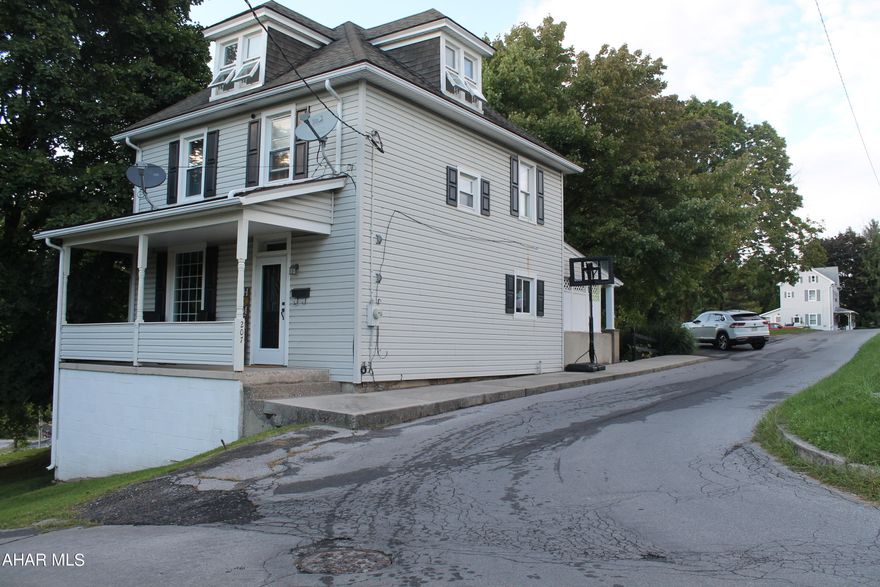 Move right into this well maintained 3 bedroom, 1 bath home in Roaring Spring. The large finished attack offers a bonus room, plenty of storage, or can easily be made into a 4th bedroom. This home has a large yard, 1 car garage, a shed and off street parking for several cars. The back porch offers so many possibilities with space for the whole family. Do not wait to see this lovely landscaped home in the borough.