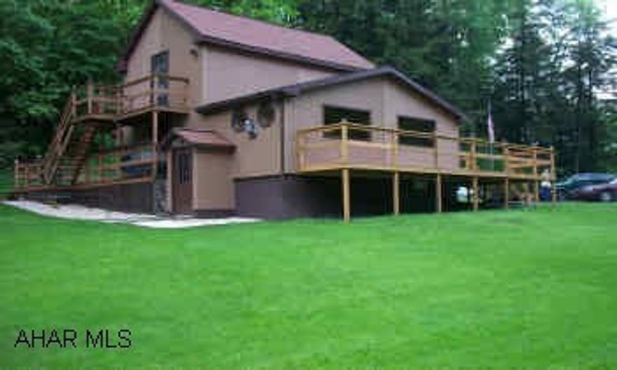 Beautiful, private 1 BR, 2 bath two story home on 1.3 acres with a stream in front yard, borders State Game Lands, completely remodeled ceramic tile floors & counter tops, stone fireplace, many beautiful handcrafted doors, wood work and cabinets. Beautiful private 1 BR, 2 bath, two story home on 1.3 acres with a stream in the front yard, borders State game Lands, completely remodeled ceramic tile floors and counter tops, stone fireplace, many beautiful handcrafted doors, wood work and cabinets.  WILL TAKE BACK UP OFFERS!!