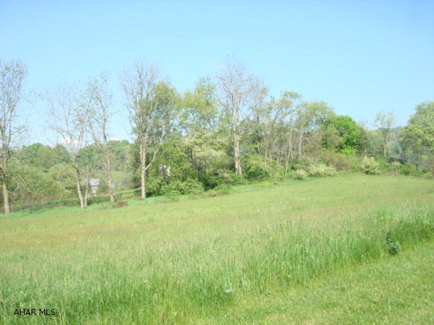 Beautiful 2.17 acre building lot in the scenic Tumblehill subdivision in Warriors Mark.  Gorgeous views, quiet country living, perc test done, public water, underground electric and flat to rolling terrain. Restrictive covenants.