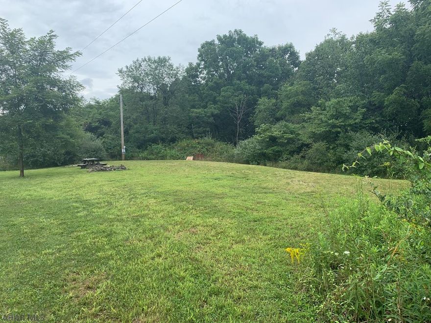 Located not far from town with easy access to Route 30 you will find this delightful 12+/- acre property with electric already on site. Property would make a great location to build your dream home or getaway in Mtns. that you have been thinking about oh-so often. Here you will be close to the Juniata River, HB&T Trails, Lake Raystown and other great attractions that our area has to offer. One could not ask for a more convenient location if you are looking for outdoor adventures!