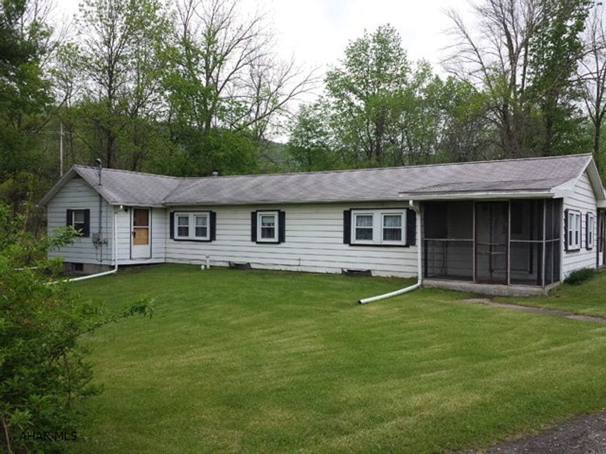 Spacious 4 bedroom double wide with addition. Partial basement. Central air conditioning. All appliances. Additional 60' x 200' parcel with carport and shed included in sale. Call Listing Agent for details.