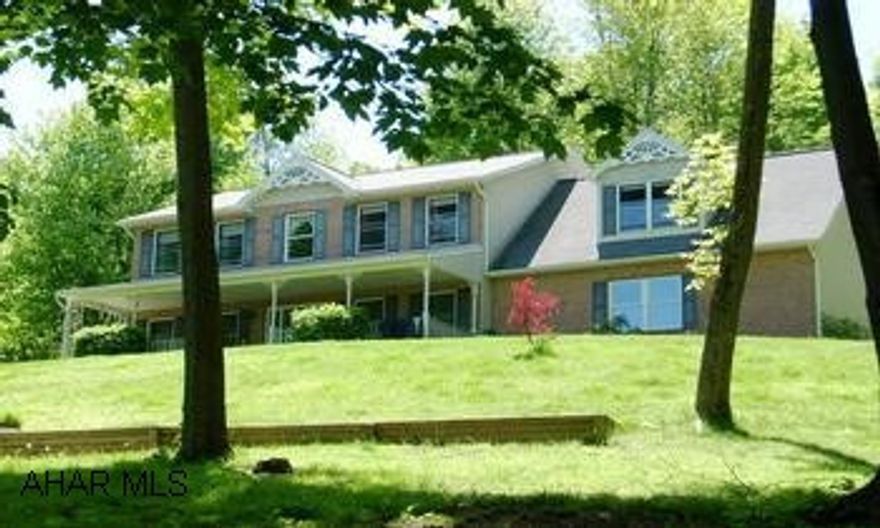 2 STORY BRICK & VINYL ON 1.7 ACRES; VERY PRIVATE SETTING WITH INCREDIBLE VIEW OF MOUNTAIN RANGE. SPACIOUS 4 OR 5 BEDROOM, 2.5 BATHS, 9 FT. CEILINGS, CENTRAL AIR, TILE FOYER, 8 FT. WIDE FRONT PORCH WITH VIEW, REAR DECK, LANDSCAPED PROPERTY, PAVED DRIVEWAY, 1ST FLOOR LAUNDRY.