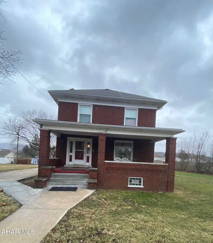Large two story brick home sits on large lot in a convenient and central location of the AASD. This home has great structure and bones. Main floor living room, kitchen, and dining room with some original woodwork trim/doors. 3 spacious bedrooms with original hardwood floors and full bath on 2nd floor. Concrete driveway for multiple cars off-street parking.
