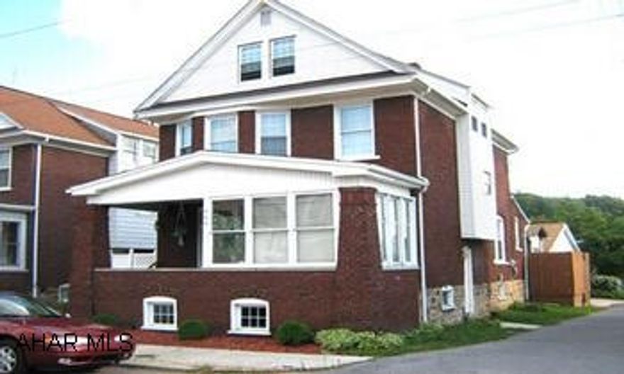 When you walk in the door, you'll know it's the one. Beautiful foyer with original woodwork, newer oak kitchen, LR, DR, gas fireplace, 4BRs on 2nd fl, 2 heated, finished rooms in attic. Private courtyard-no yard work required! ADT Security System.