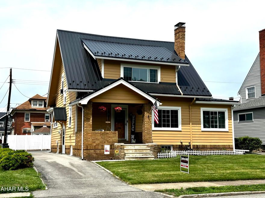 Step into this beautifully renovated, charming home that is just outside of Mansion Park! A fresh roof was installed in November 2022 as well as brand-new windows in summer of 2022. The large kitchen boasts upgraded stainless steel appliances. Embrace outdoor living with a detached garage accompanied by a covered patio.  Adjacent to the living area, a versatile sunroom opens up a world of possibilities. The warmth and charm of the wood-burning fireplace in the spacious living room sets the perfect ambiance. The master suite offers ample storage with a sizable full bathroom. There is an additional bonus space on the lower level, the perfect blank slate for your needs. Tuckahoe Park is just a short walk across the street! Welcome to your dream abode!