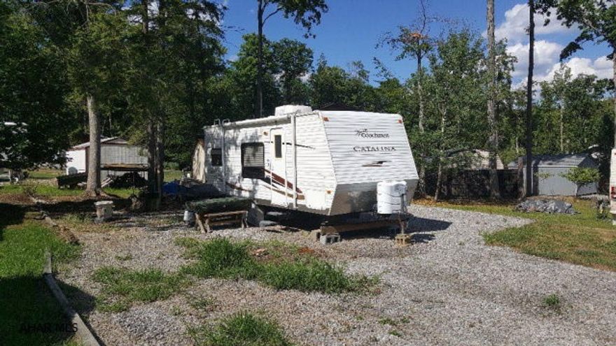 2010 21' Coachmen camper and campsite for sale in Glendale Yearound. This camper is in very good condition. One double bed and three bunk beds. W/S and electric are hooked up and ready to use yesterday. Glendale Yearound is only minutes from Glendale Lake and 15 minutes from Rock Run ATV Park. Community Pool, Basketball, Tennis, Baseball, Soccer and more.