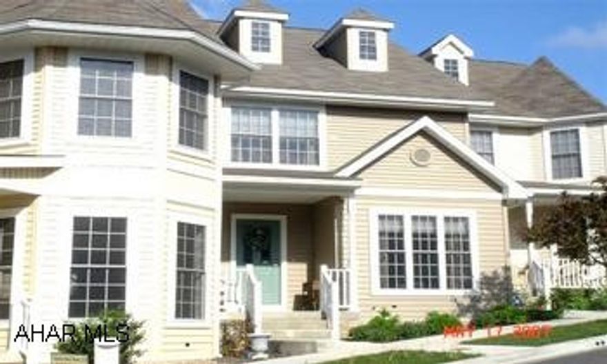 STUNNING 3 STORY TOWN HOME WITH OPEN FLOOR PLAN.  UPGRADES THROUGHOUT.  WALK OUT BASEMENT, 2 CAR GARAGE.  TRULY A "MUST SEE" IN HOLLIDAY HILLS. STUNNING 3 STORY TOWN HOME WITH OPEN FLOOR PLAN.  UPGRADES THROUGHOUT.  HARDWOOD FLOORING, CUSTOM EAT-IN KITCHEN WITH STAINLESS APPLIANCES AND PANTRY.  TWO LARGE BEDROOMS AND SPACIOUS BATH AND CLOSETS ON SECOND FLOOR.  3RD FLOOR BEDROOM/STUDY WITH BUILT-IN LIBRARY SHELVES.  LAUNDRY LOCATED IN READY-TO-FINISH, FULL, WALK-OUT BASEMENT.  CUSTOM HUNTER DOUGLAS WINDOW BLINDS AND UP-GRADED LIGHTING THROUGHOUT.  COVERED PORCH, REAR DECK, ENCLOSED COURTYARD, AND LARGE 2 CAR DETACHED GARAGE.  ATTRACTIVE LANDSCAPING.  SECURITY SYSTEM.  LOW MAINTENANCE.  NO ASSOCIATION FEES.  PRISTINE CONDITION.  CONTACT GAIL CORLE FOR SHOWING @ 932-3231.