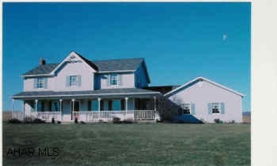 Country 2-Story 4 bedroom home with beautiful view, large level lot, wrap around porch and attached garage.