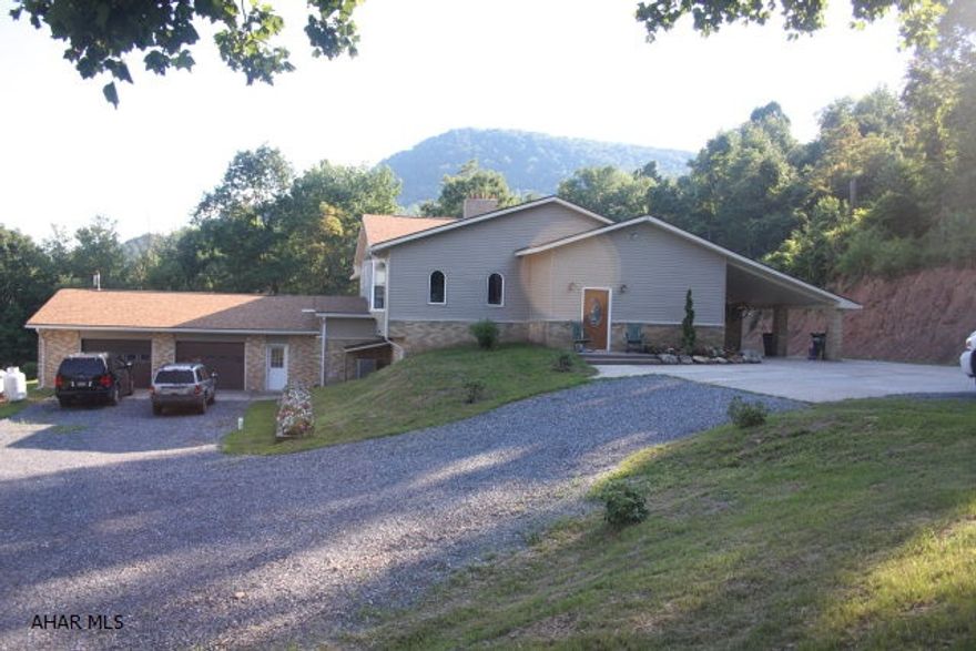 Horse Lovers? Extended Live In Family? In home Business? Over 4500 sq ft ALL BRAND NEW on 2.3 Ac borders State Game Lands and horseback riding trails! 4 bed 3 bath plus gourmet kitchen has granite counters, marble floor, glass back splash and stainless appliances. Din rm, liv rm and hall have awesome HW floors.  Master bed has 2 walk in closets,a 13x24 master bath with 5x6 walk in shower, claw foot tub with view, and bonus room for hot tub or sauna! The lower level is perfect for theatre or additional suite with a kitchen, huge fam rm with fireplace and bar, bed room, 3/4 bath. 2-3+ car garage has workshop. Carport.  New gas heat pump for heat and AC and on demand water heater. Outbuilding/barn can be adapted for horses, plus 3 exterior rooms for workshop,or storage. MUST SEE!