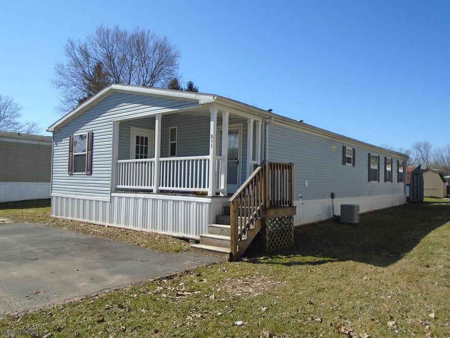 AWESOME NEW PRICE!!! Motivated Seller!! 2012 Champion Redman home in Cross Keys mobile home park. 3 bedroom 2 bath all on one level. Beautiful white kitchen cabinets. Updated SS stove and dishwasher.Great living space with a living room and family room. Cover porch and side deck. Shed.