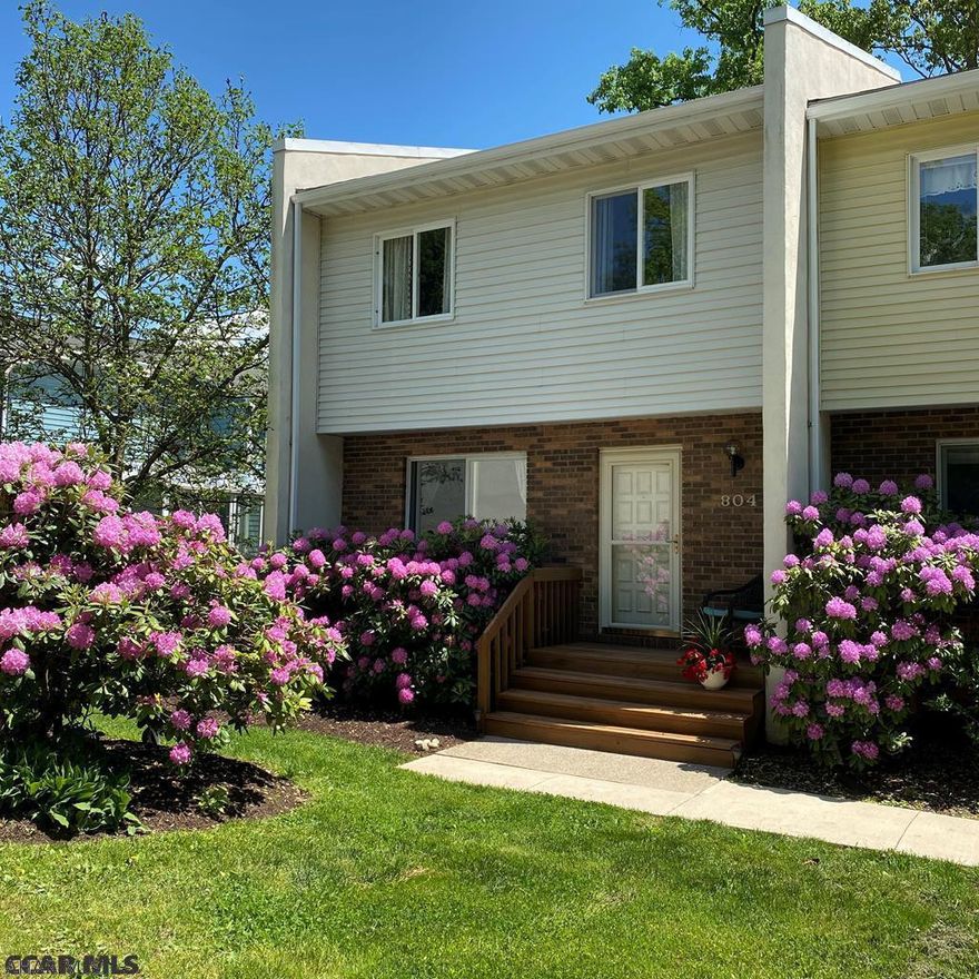 It might be small, but it has it all.  An open floor plan with beautiful hardwood floors provide low maintenance and easy living./  Enjoy you cup of coffee on the private deck or in the warmth of updated kitchen.  This townhome is in "move-in" condition and ready to greet the new owner.  The unfinished basement provide both storage and room to expand.  The property features a one car detached garage with an additional off-street parking space, central AC, a natural gas stove for those cool days and nights, and for buyer peace of mind a Home Warranty.  Virtual tour:  https://youtu.be/5Tiu1flH-DQ