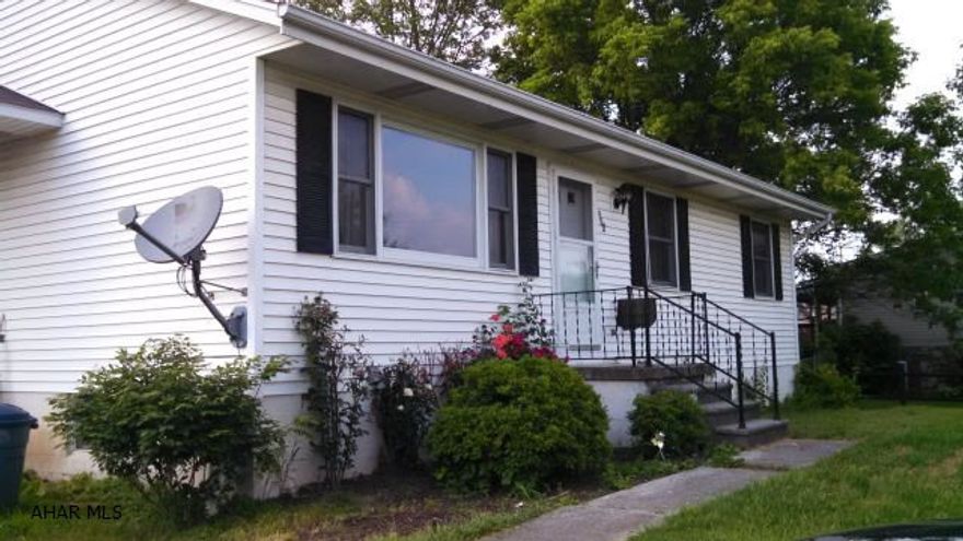 This 3 bedroom rancher is in a peaceful, quiet neighborhood in Bellwood. It has a large, bright eat-in kitchen. The back yard is fenced and has a dog kennel along the back of the property.