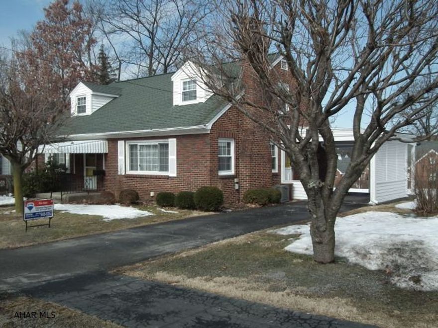 This 3 bedroom brick home is conveniently located within walking distance to quaint downtown Hollidaysburg, library, and schools. 60 x 120 yard offers plenty of yard for family fun. Home has carport and detached garage. Large spacious living room with wood burning fireplace and hardwood floors under carpeting. Mechanics are new or newer.