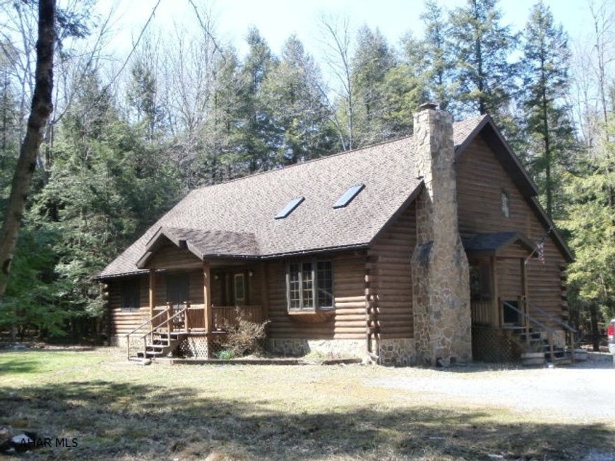 Beautiful log 1.5 story home on large lot with detached two car garage. Fireplace in master bedroom and living room, large kitchen and living room, 1st floor laundry, loft area overlooks the living room, full basement with additional flue for woodburner. Too much to list. New roof!