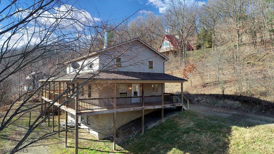 Are you looking for a house close to Raystown Lake?  This spacious house would make the perfect getaway, or a permanent residence! This home features 5 bedrooms, 2.5 half baths, 1st floor laundry and an enormous wrap around composite deck perfect for entertaining!! This beautiful home was built approximately 11 years ago on 2.82 acres. Its surrounded by 1000s of acres of ground owned by the army corp of engineers which would make a great area to hunt. From the driveway, you are roughly 1/2 mile from entry to the lake, perfect for kayaking  or fishing.  Close to Tatman Run, Shy Beaver, James Creek, & Aitch boat launches and only 5 miles from Raystown Resort. This could make an excellent AirBNB! Preapproved buyers only, please remove shoes for showing. Buyer to confirm taxes, sq ft, lot size