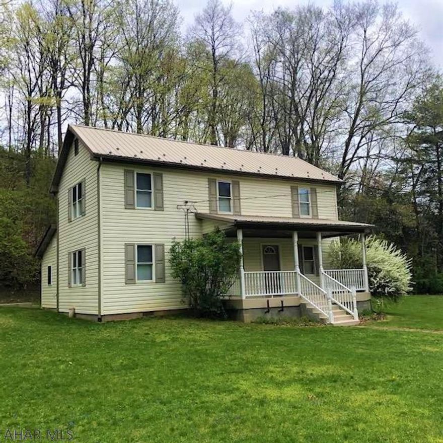 This adorable home is updated and ready for its new owner. Nestled beside "Raven Run" you can't help but relax at the sound of the flowing creek while enjoying an evening around the firepit,  lounging on the large front porch or gardening in the spacious yard. Located just a short drive to Game Lands, Rails to Trails Paths and Raystown Lake for more fun and relaxing on the lake. This property won't last. Schedule your showing right away.