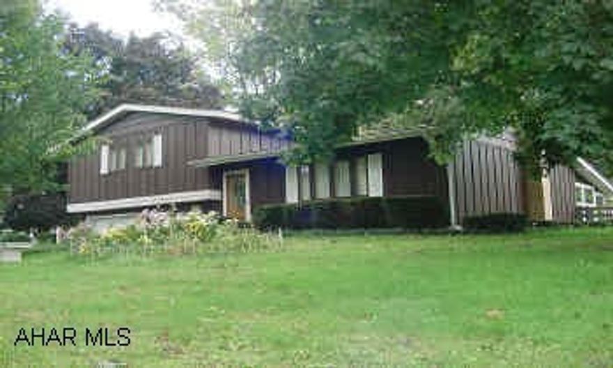 4 LEVEL SPLIT WITH PLASTER WALLS, FIREPLACE, GARAGE, KITCHEN IAD APPLIANCES. ELECTRIC HEAT STORAGE ONLY $120 MO. BUDGET.  REDUCED! ELEGANT 4 LEVEL SPLIT ON A LARGE TRIANGULAR CORNER LOT WITH PLASTER WALLS, FIREPLACE, GARAGE, SHED, SUNPORCH, AND KITCHEN AID APPLIANCES! NEW DRIVEWAY-EVERYTHING WELL CARED FOR. GOOD CLOSETS, GOOD CARPETING, TILE FLOOR. CALL MIKE MANGIA X121 OR 941-3997.