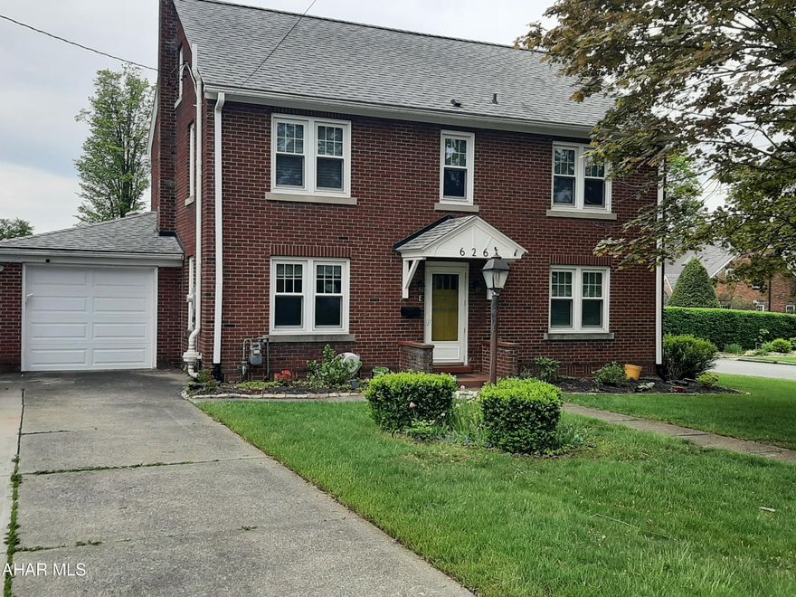 Welcome to your Ebensburg Oasis! This sturdy brick home in Central Cambria School District offers so much charm, character, and many modern conveniences. Walk in the front door to beautiful hardwood floors that lead you into the dining room or kitchen. The kitchen offers expansive quartz countertops with plenty of maple cabinetry and updated appliances. The coffee maker even has its own water dispenser! Under cabinet lighting, garage entry and walk out to the patio also add to the kitchen features. The large living room offer a gas fireplace, built-ins on each side with a really cool TV mount above. The main floor office offers natural light through the glass block wall as well as the main floor bathroom with walk in shower and built in storage. On the second level you will find four great sized bedrooms with storage and an updated full bath. Newer carpet flows throughout. One bedroom offers a walkout to the balcony with a swing and retractable awning. The finished attic also offers the possibility of two more bedrooms or office space or work-out space. One room offers a built-in dresser. Closet storage and cubby storage. The basement surprises you with censored lighting on your way down the steps. This lower-level space houses the mechanics of the home and many storage areas. You will also find the laundry and half bath. And believe it or not a finished bedroom with a mirror hiding the secret safe. This room also has a gas burning fireplace and carpet to keep it cozy. Now to the outdoor oasis. Step out of the kitchen to the expansive patio with inground heated swimming pool, pergolas, hot tub, grill with its own gas line, outdoor lighting, and even plenty of fenced yard space for outdoor activities. This home is a must see! Call for you tour today!  Open House on Saturday 5/25/24 from 10AM -Noon.