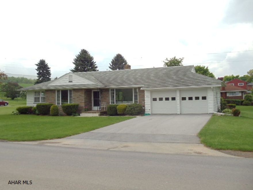 Convenient 1-story living with laundry room on main level, formal dining room, newer windows, & central air.  Beautiful distant views of mountains from back porch.  J-068