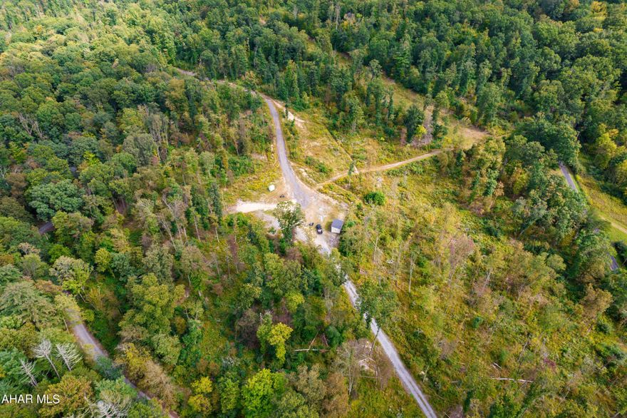 This property features 124.1 wooded acres that adjoins State Game Lands!! Perfect for hunting, hiking, atving or just enjoying nature. Driveway installed and this land was previously perc tested and passed. Great place just to get away from it all but still a short drive to all amenities.