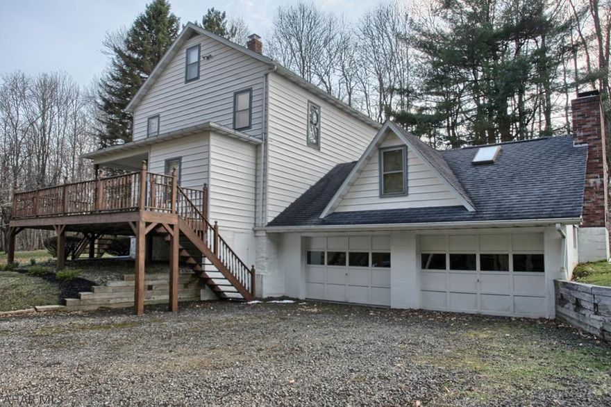 Looking for country living and privacy, but don't want to travel too far from the city to find it?  Then this 3 bedroom, 1.5 bath home is for you!  Located less than 5 minutes from town but still surrounded by trees for a peaceful retreat within the city limits.  Relax on your deck while watching the wild life in your own backyard.