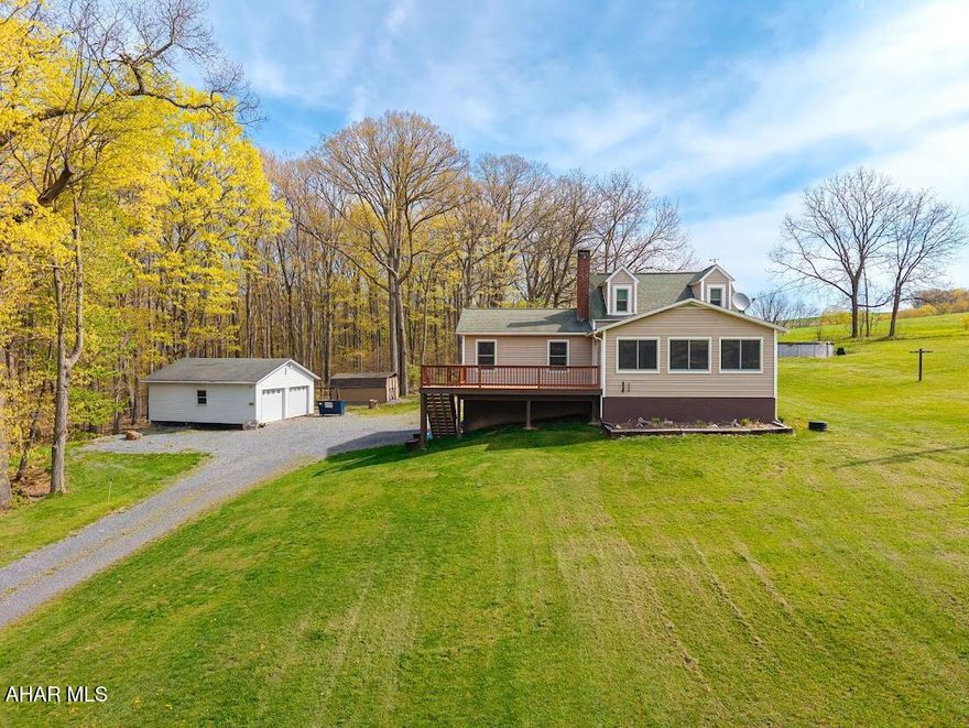 Loving the county, this home is for you!! Situated on 2.04 acres, surrounded by fields and woods.  A 2-3 bedroom with 2 full baths. The spacious master suite offers a jacuzzi tub and separate shower with double sinks.  The large Anderson windows in the living room gives beautiful views of the countryside giving access to the large  front deck. The kitchen has maple cabinetry with pantry. The family room is is finished with pine wood walls and access to the outside.  This is a muct see Home Sweet Home!!