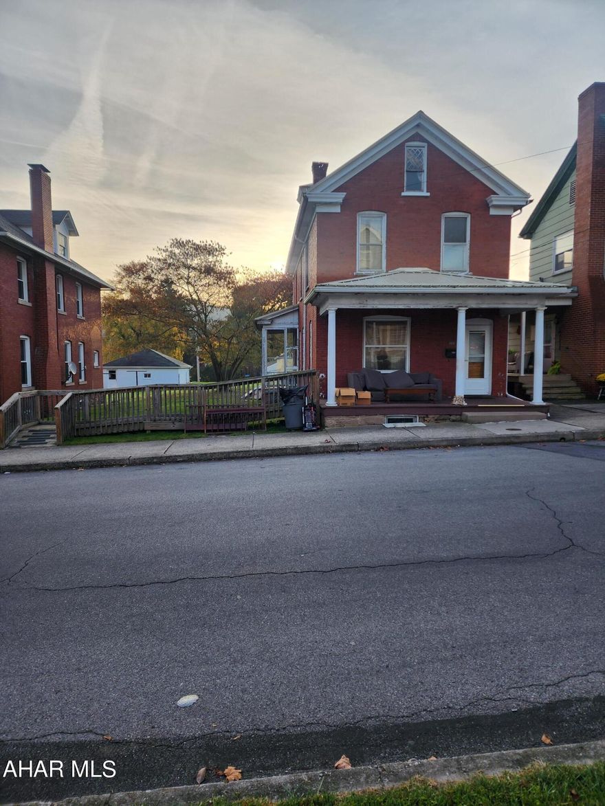 Two story brick 3 bedroom Home.  Needs TLC  . Bedrooms are nice size. Half bath on the first floor and basement, 8 inch wood trim . This home is looking for someone to restore . Handy man wanted. Schedule a tour.